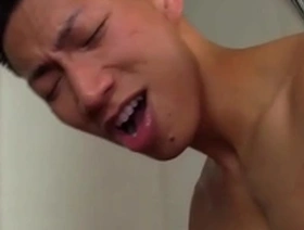 Skinny tattooed white guy and Asian twink have raw sex with deepthroat blowjobs and anal sex.