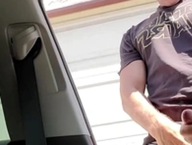 Young Asian man has a big cock and he cums in public in an alley.